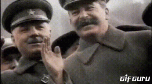 Two Men In Military Uniforms GIF