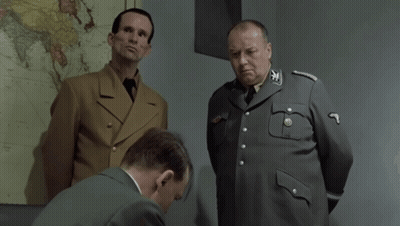Two Men In Military Uniforms Are Standing Next To Each Other And One Has The Number 9 On His Sleeve GIF