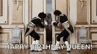 Two Men In Military Uniforms Dancing In Front Of A Door GIF
