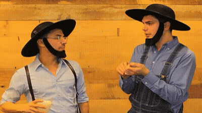 Two Men In Overalls And Hats GIF