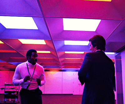 Two Men In Purple Lights GIF
