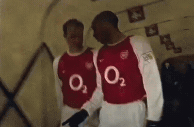 Two Men In Red And White Jerseys With O2 GIF