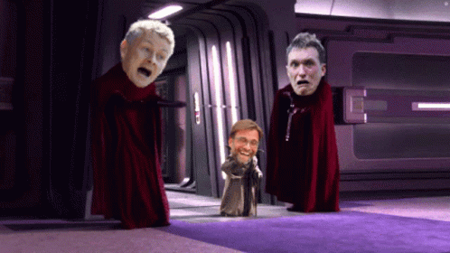 Two Men in Red Capes