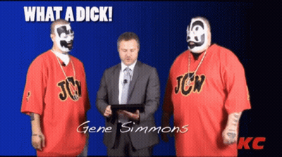 Two Men In Red JCW Shirts Standing Together GIF