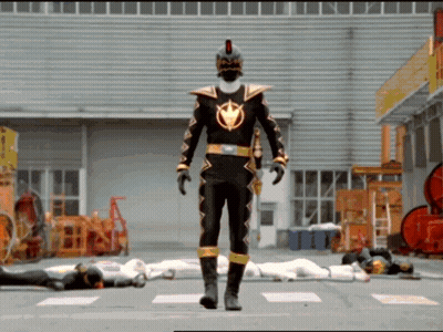 Two Men In Red Superhero Costumes GIF