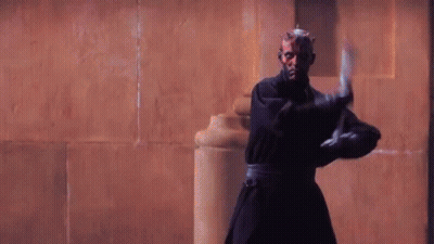Two Men In Robes Standing Together GIF