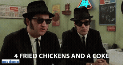 Two Men In Suits And Hats At Table Saying 4 Fried Chickens And A Coke GIF