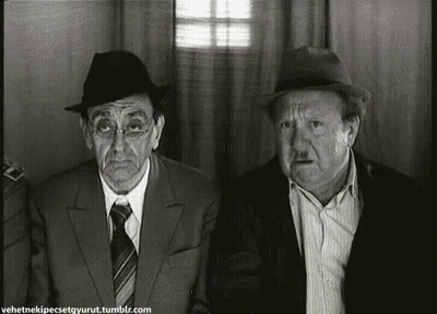 Two Men In Suits And Hats In Black And White Photo GIF