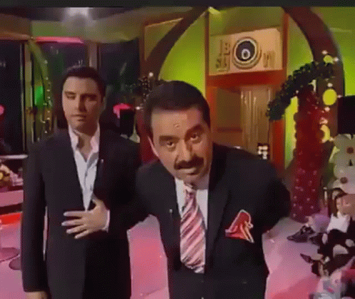 Two Men In Suits And Ties GIF