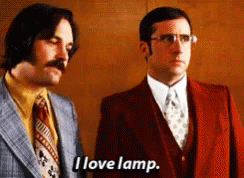 Two Men In Suits And Ties Are Standing Next To Each Other And One Of Them Is Saying I Love Lamp GIF