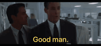 Two Men In Suits And Ties Are Standing Next To Each Other And One Of Them Says Good Man GIF