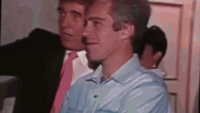 Two Men In Suits And Ties Are Standing Next To Each Other . One Of The Men Is Wearing A Pink Tie . GIF