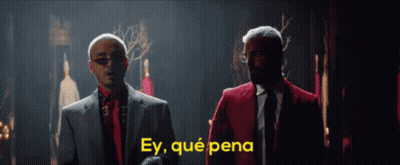 Two Men In Suits And Ties Are Standing Next To Each Other With The Words Ey Qué Pena Written In Yellow GIF