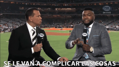 Two Men In Suits And Ties Are Talking In Front Of A Fox Broadcast Of A Baseball Game GIF