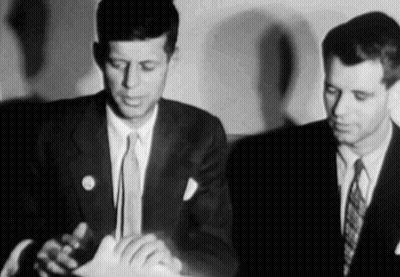 Two Men In Suits And Ties GIF