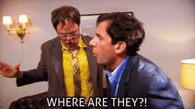 Two Men In Suits And Ties Standing Together GIF