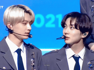 Two Men In Suits And Ties With Number 021 GIF