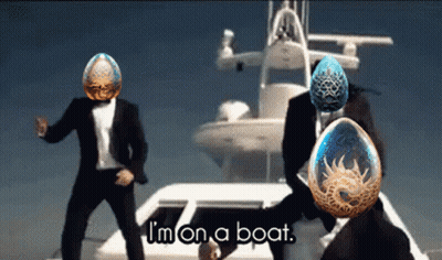 Two Men In Suits Are Dancing In Front Of A Boat With The Words " I 'M On A Boat " On The Bottom GIF