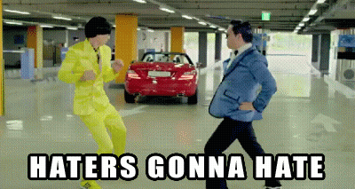 Two Men In Suits Dancing With Haters Gonna Hate GIF