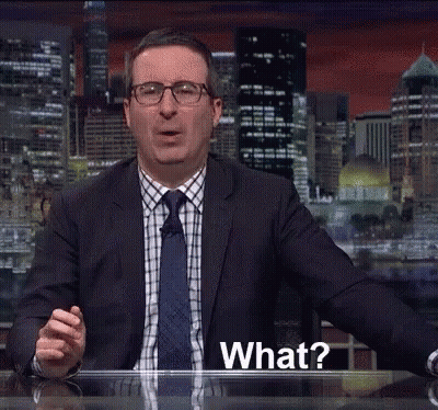 Two Men In Suits Drinking Coffee GIF