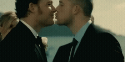 Two Men In Suits Kissing GIF
