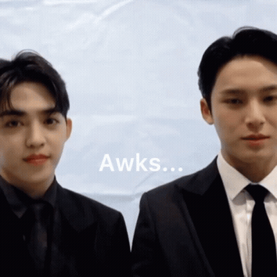 Two Men In Suits Saying Awks GIF