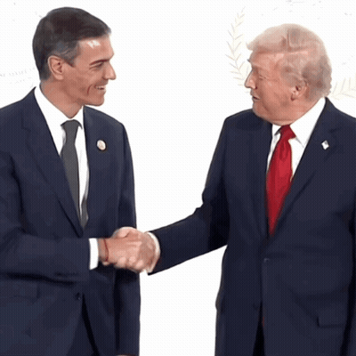 Two Men In Suits Shaking Hands GIF