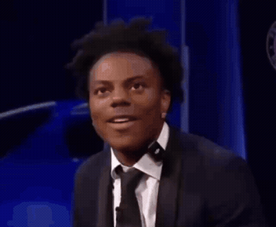 Two Men In Suits Sitting At Table GIF