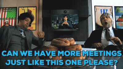 Two Men In Suits Sitting At Table With Donuts Saying Can We Have More Meetings Just Like This One Please GIF