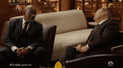 Two Men In Suits Sitting On Couch The Blacklist GIF