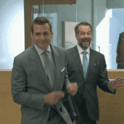 Two Men In Suits Smiling GIF