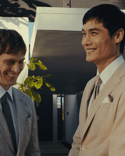 Two Men In Suits Smiling GIF