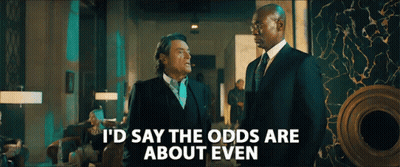 Two Men In Suits Standing Next To Each Other With The Words " I 'D Say The Odds Are About Even " On The Bottom GIF