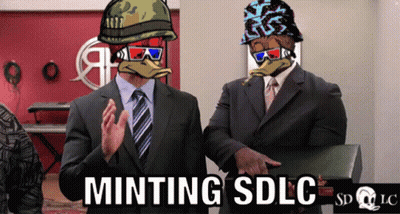 Two Men In Suits Standing Next To Each Other With The Words Minting Sdlc Written On The Bottom GIF