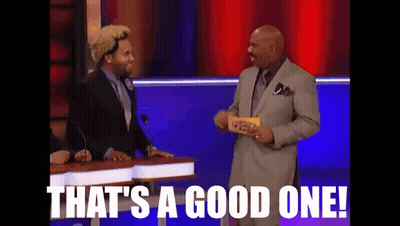 Two Men In Suits Standing Together GIF
