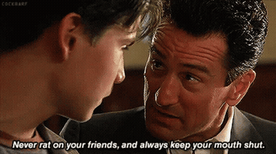 Two Men In Suits Talking GIF
