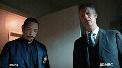 Two Men In Suits With NBC Logo GIF