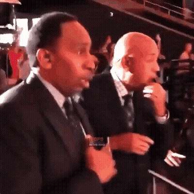 Two Men In Suits With Word Shopd GIF