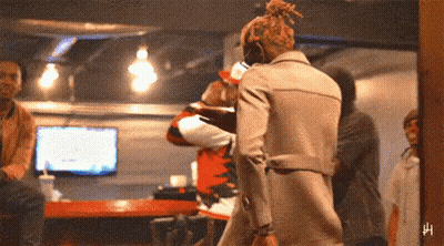 Two Men In Sunglasses And Hats Posing GIF