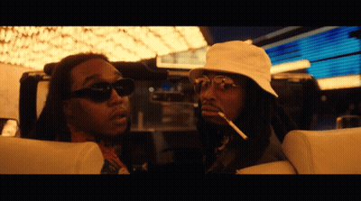Two Men In Sunglasses And Hats Sitting In Car GIF