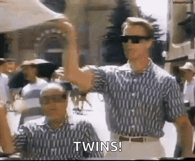Two Men In Sunglasses And Striped Shirts GIF