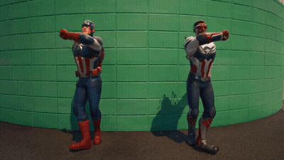Two Men In Superhero Costumes GIF
