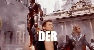 Two Men In Superhero Costumes GIF