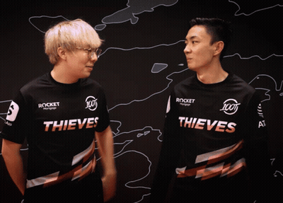 Two Men In Thieves Shirts Standing Together GIF