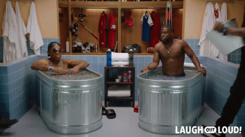 Two Men In Tubs Laugh Out Loud GIF