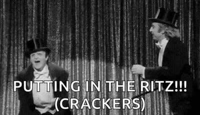 Two Men In Tuxedos And Top Hats On Stage GIF