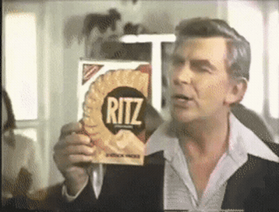 Two Men In Tuxedos And Top Hats On Stage GIF