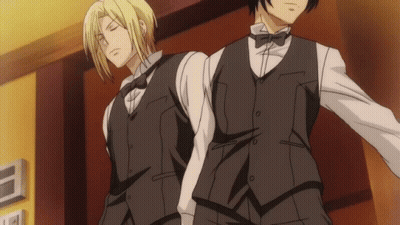 Two Men In Tuxedos Standing Together GIF