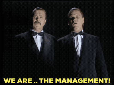 Two Men In Tuxedos We Are The Management GIF