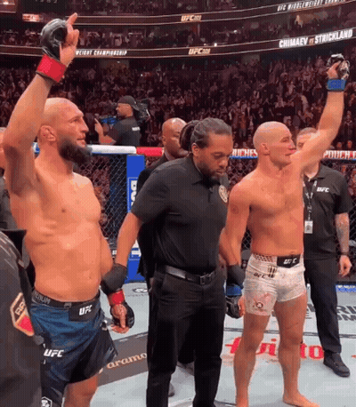Two Men In UFC Shorts GIF